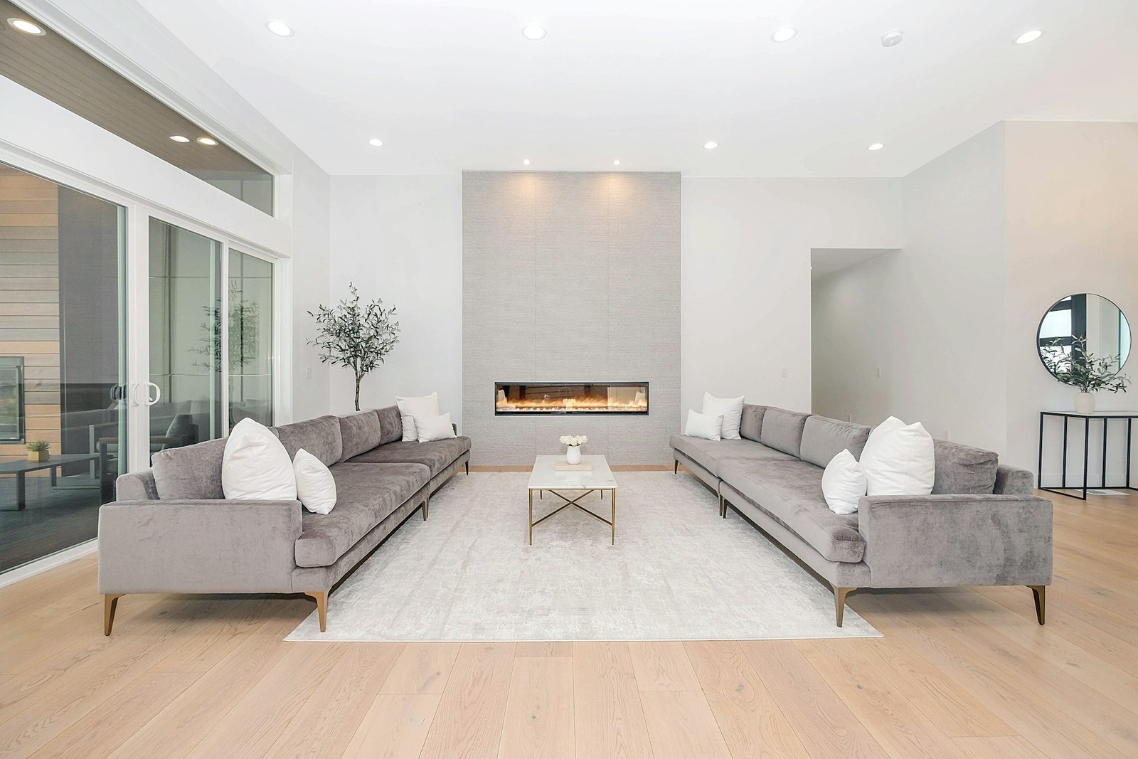 Modern living room with wide-plank wood floor