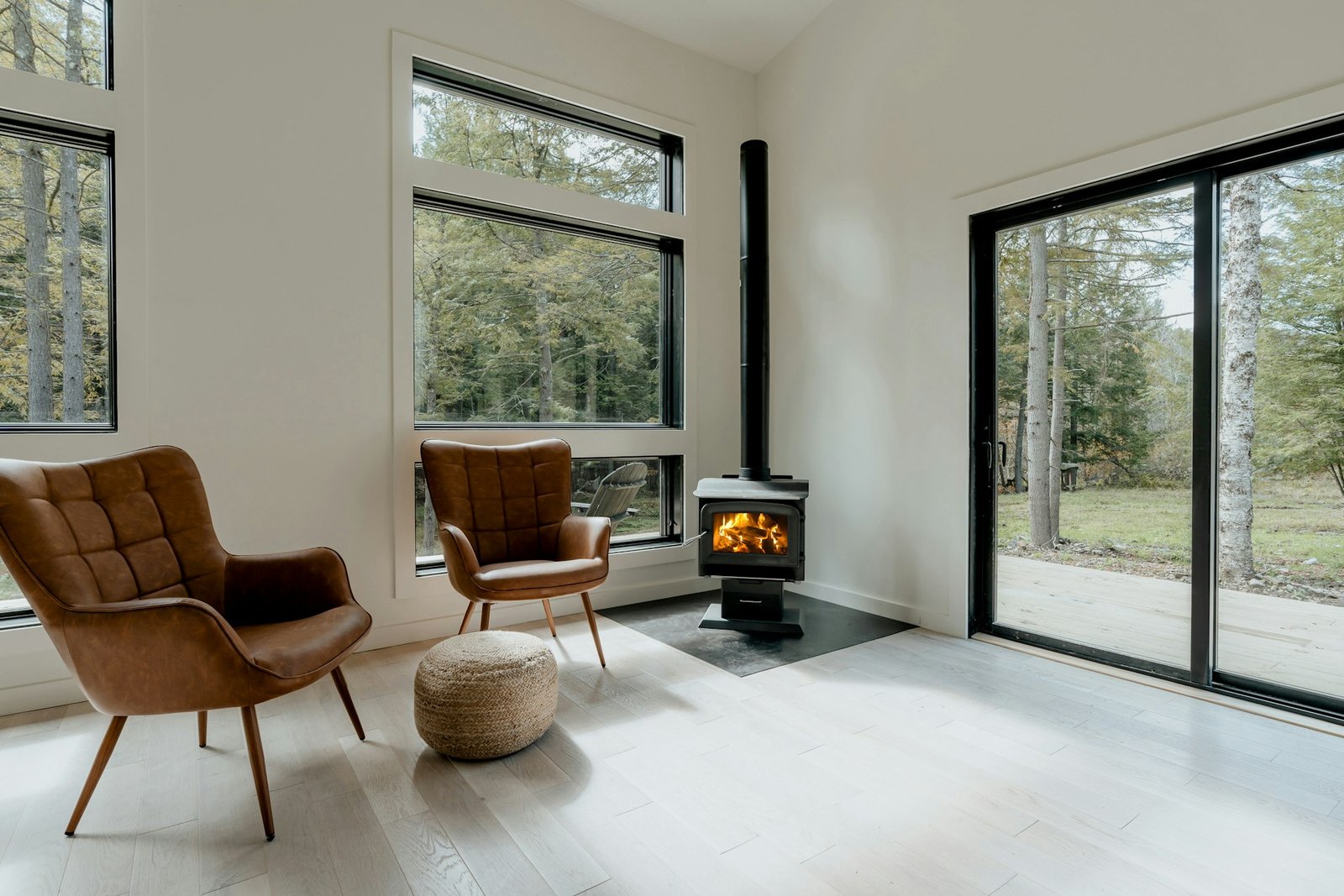 Living room with wood floors and a fireplace